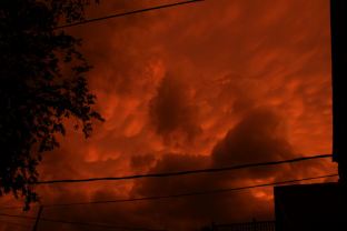Gnarly Storm Forming Over Saint Paul at Sunset - by AndoR